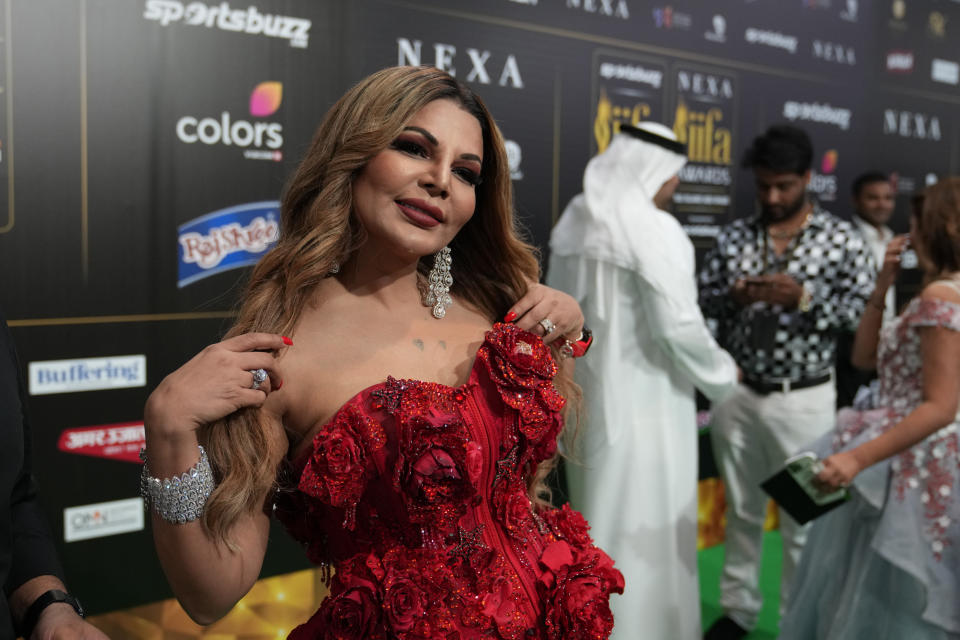 Indian actress Rakhi Sawant poses on the green carpet ahead of the 22nd International Indian Film Academy (IIFA) awards in Abu Dhabi, United Arab Emirates, Friday, June 3, 2021. (AP Photo/Kamran Jebreili)