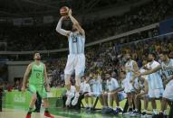 2016 Rio Olympics - Basketball - Preliminary - Men's Preliminary Round Group B Argentina v Brazil - Carioca Arena 1 - Rio de Janeiro, Brazil - 13/08/2016. Andres Nocioni (ARG) of Argentina shoots the three pointer to tie the game at 85. REUTERS/Jim Young