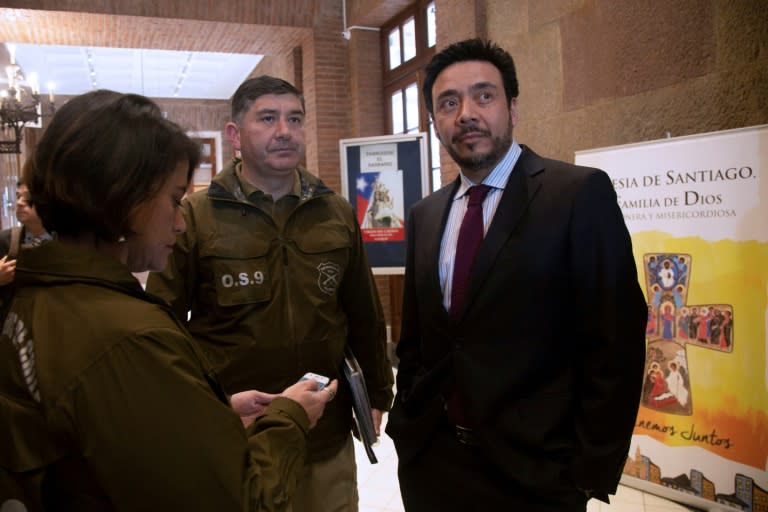 Emiliano Arias (R), who is leading the investigation into a cover-up of sexual abuse by the Chilean church, pictured in Santiago on July 12, 2018