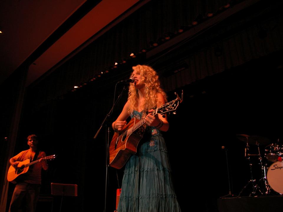 Taylor Swift plays guitar and sings during a concert Aug. 15, 2006, in Alliance High School's auditorium. Swift was one of the opening acts for a fundraiser concert for the Greater Alliance Carnation Festival.