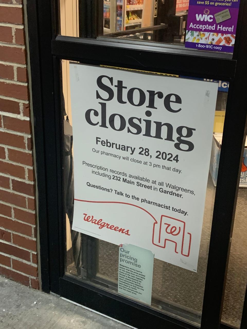 A sign on the door of the Walgreens in Gardner Plaza on Pearson Blvd. announces that the location will close at 3 p.m. on Wednesday, Feb. 28.
