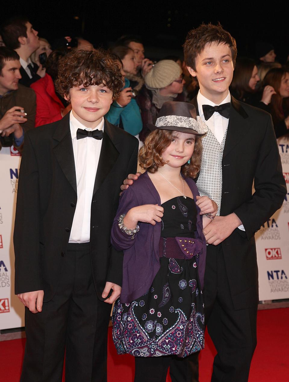 (l-r) Daniel Roche, Ramona Marquez and Tyger Drew-Honey from Outnumbered arriving for the 2011 National Television Awards at the O2 Arena, London.