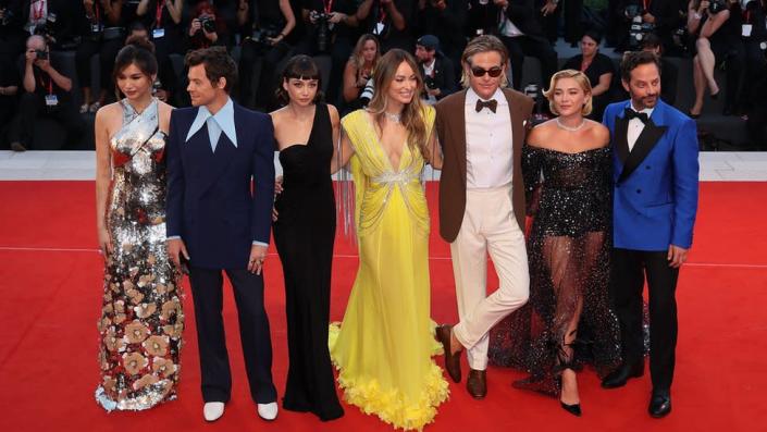 (Left to right) Gemma Chan, Harry Styles, Sydney Chandler, Olivia Wilde, Chris Pine, Florence Pugh and Nick Kroll on the red carpet ahead of the Don't Worry Darling screening at the Venice Film Festival
