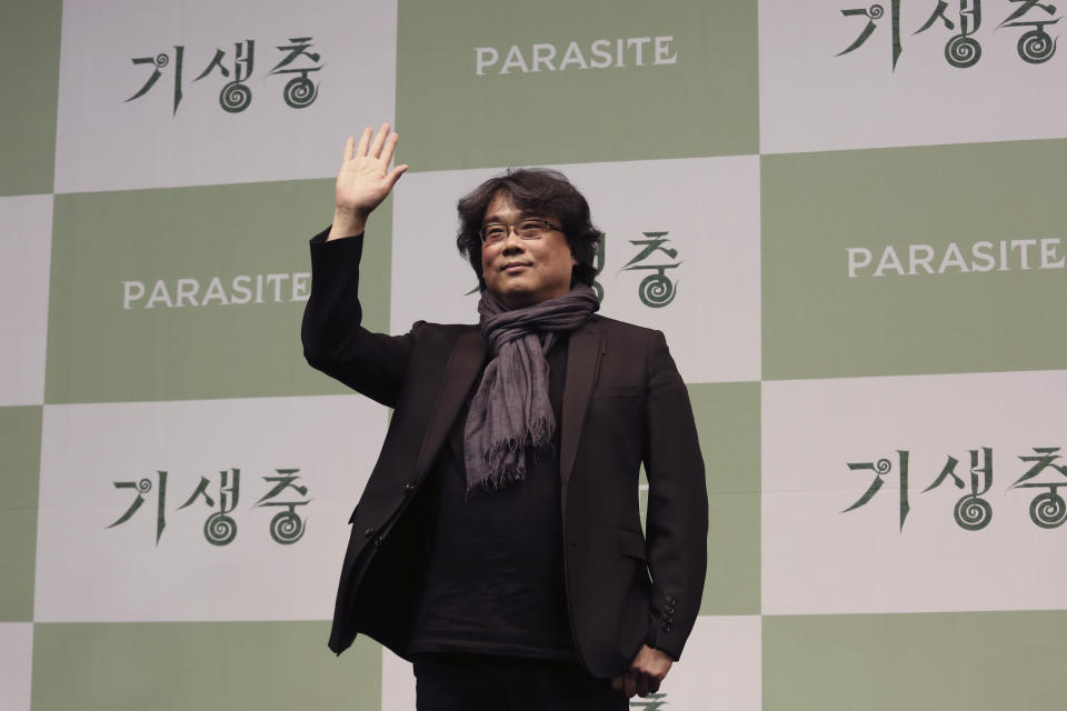 Bong Joon-ho, director of Oscar-winning “Parasite,” waves after a press conference in Seoul, South Korea, Wednesday, Feb. 19, 2020. Bong said Wednesday “the biggest pleasure and the most significant meaning” that the film has brought to him was its success in many countries though the audiences might feel uncomfortable with his explicit description of a bitter wealth disparity in modern society. (AP Photo/Ahn Young-joon)