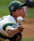 South Korea's Yeong Hyeon Kim delivers in the first inning of the Little League World Series Championship baseball game against Honolulu, Hawaii, in South Williamsport, Pa., Sunday, Aug. 26, 2018. (AP Photo/Gene J. Puskar).