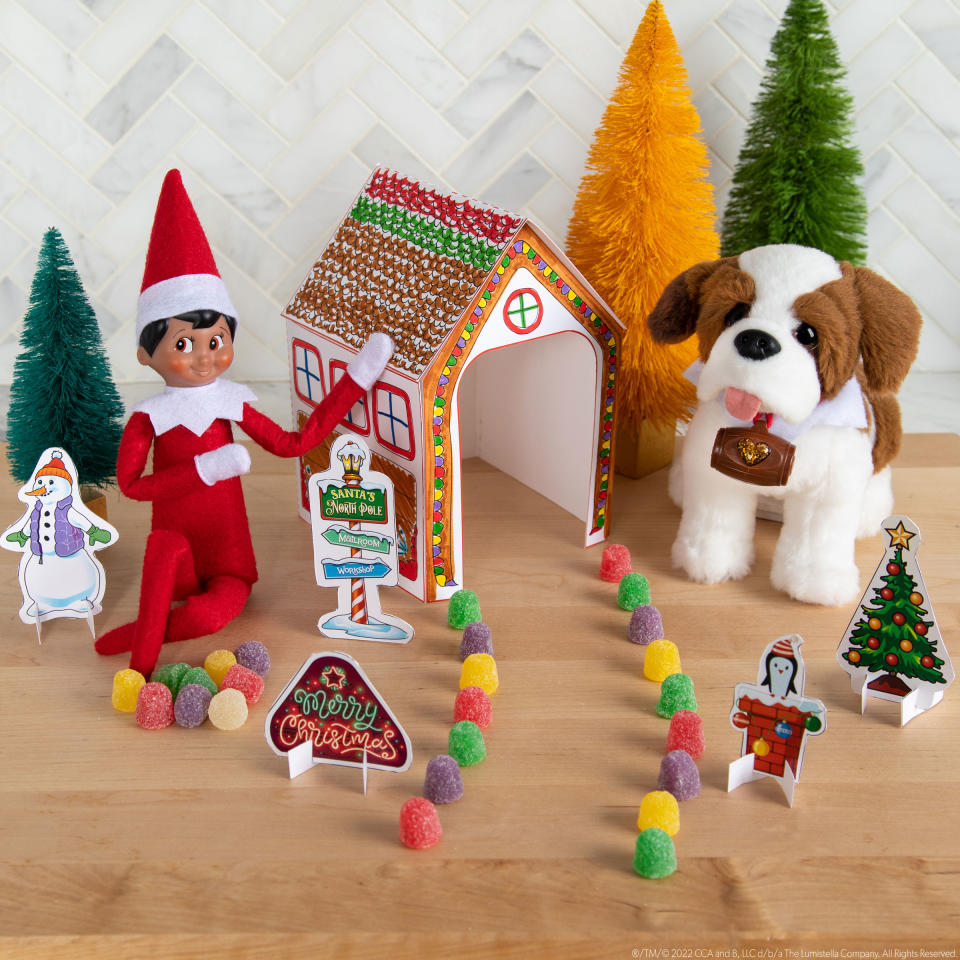 elf on shelf with dog (The Lumistella Company, home of The Elf on The Shelf®)