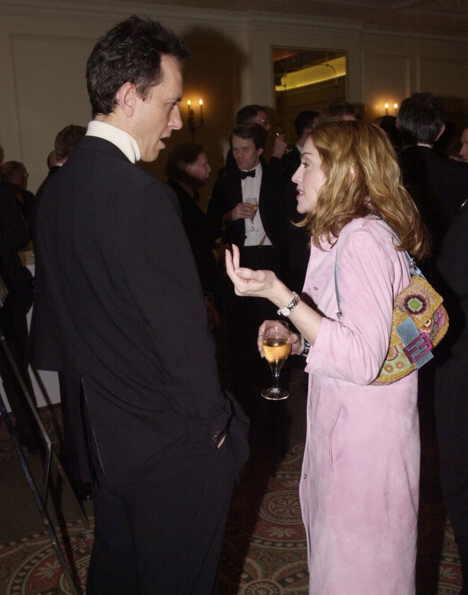 Richard E. Grant and Madonna at the&nbsp;Evening Standard British Film Awards in 2000. (Photo: Stefan Rousseau - PA Images via Getty Images)