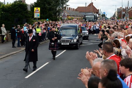 The hearse carrying the coffin of Bradley Lowery departs St Joseph's Church after his funeral service, in Blackhall Colliery, Britain July 14, 2017. REUTERS/Mary Turner