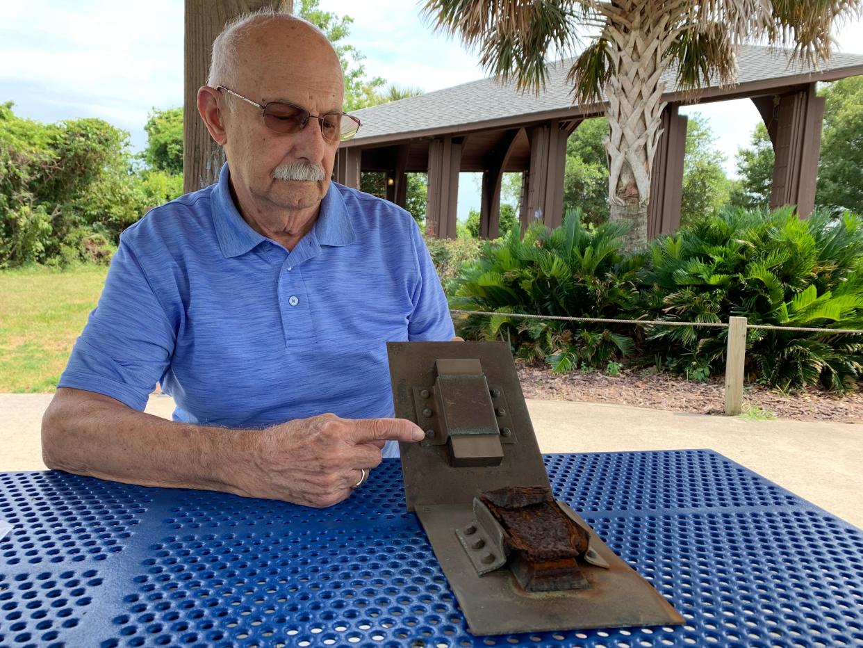 Bob Kain, a former senior corrosion scientist at the LaQue Center, holds the metal samples used to test potential corrosion on the Statue of Liberty's support structure.