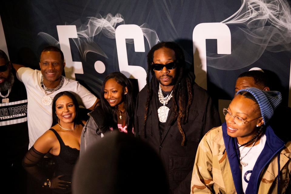 Rapper 2 Chainz poses for photos on the red carpet during the opening celebration for Esco Restaurant and Tapas in Downtown Memphis, on Saturday, December 16, 2023.