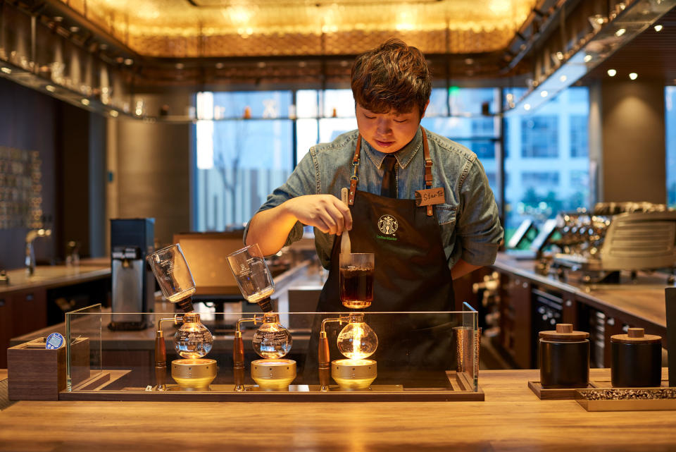 A barista working in a Starbucks in China.