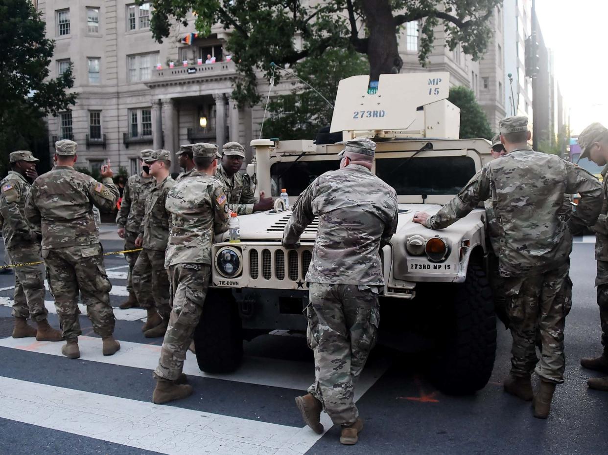 US military outside the White House in June amid anti-racism protests: AFP via Getty Images