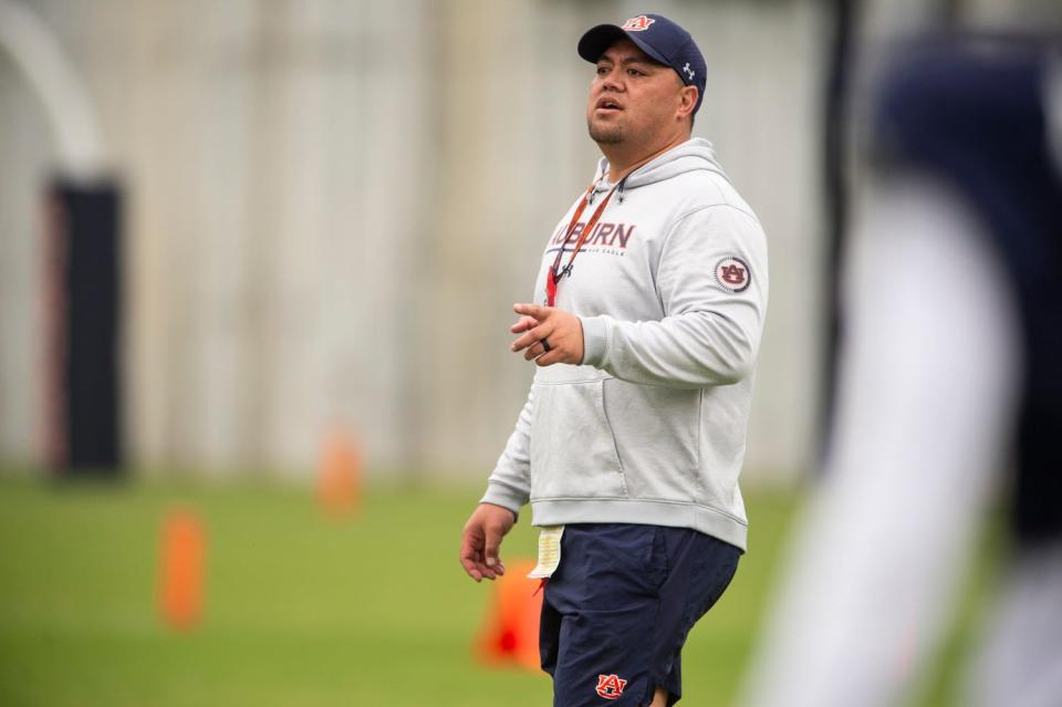 Auburn Tigers tight ends coach Ben Aigamaua during Auburn Tigers football practice at the Woltosz Football Performance Center at in Auburn, Ala., on Monday, April 3, 2023. 