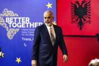 Albania's Prime Minister Edi Rama leaves after a press conference with European Commissioner for Neighbourhood and Enlargement Oliver Varhelyi in Tirana, Albania, Thursday, Feb. 29, 2024. The leaders of Western Balkan countries met Thursday in another joint push to use the European Union's financial support plan of six billion euros (about $6.5 billion) hoping it will speed up its membership in the bloc. (AP Photo/Armando Babani)