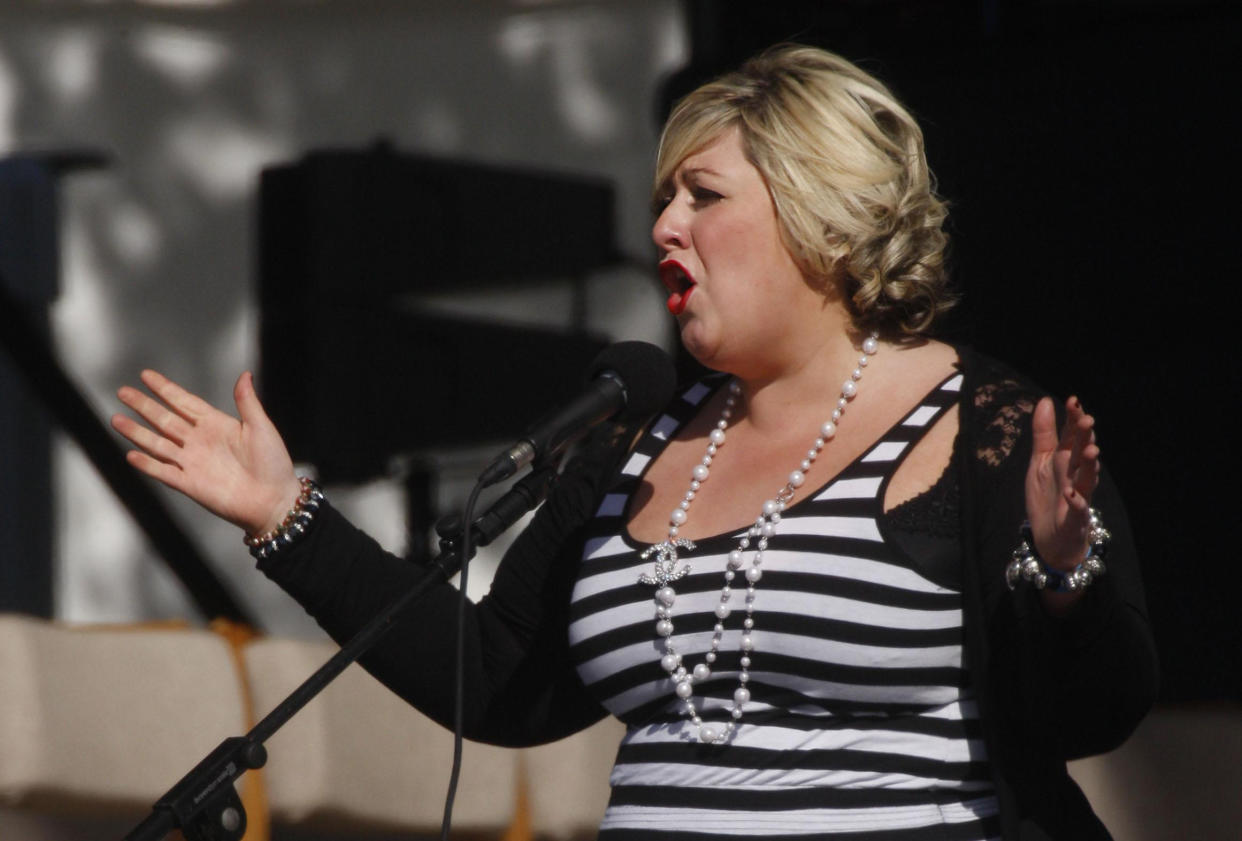Michelle McManus performs at Bellahouston park in Glasgow, ahead of an open-air mass by Pope Benedict XVI.