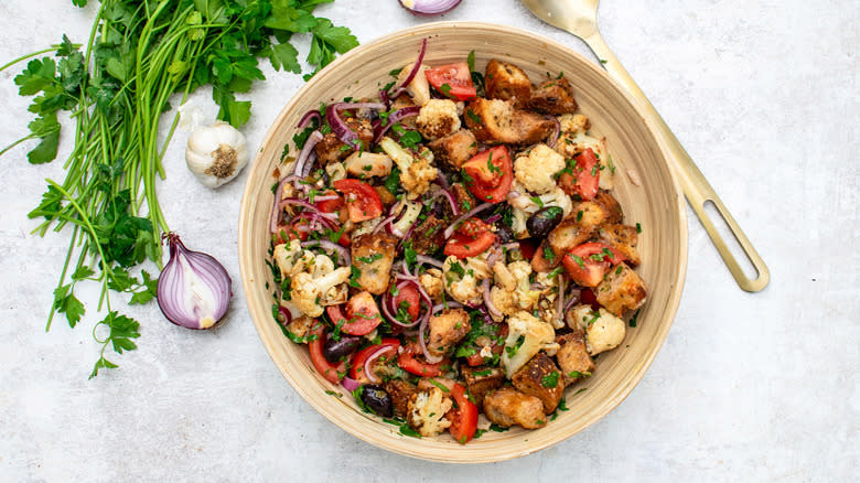 roasted cauliflower panzanella salad in bowl