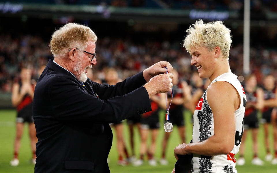 Jack Ginnivan, pictured here receiving the Anzac Day medal after Collingwood's win over Essendon.