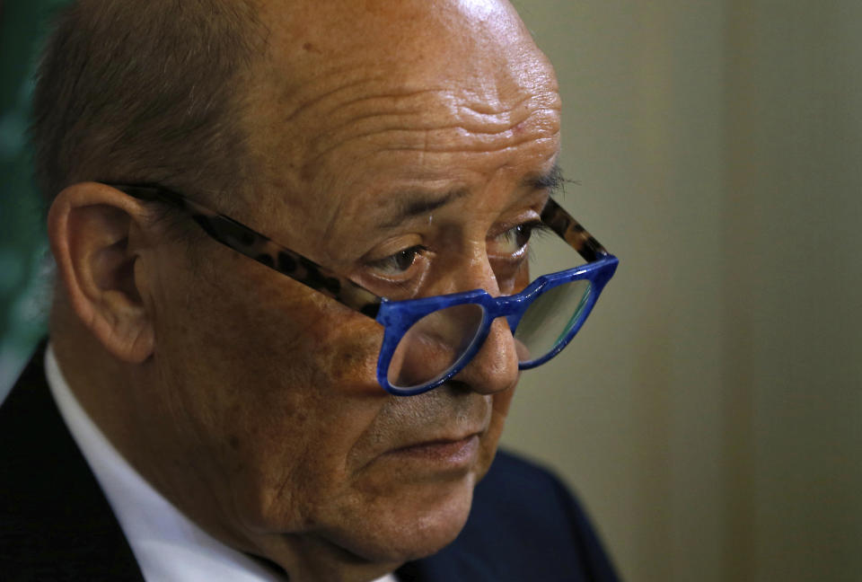 French Foreign Minister Jean-Yves Le Drian, and his Lebanese counterpart Nassif Hitti, hold a news conference following their meeting at the Lebanese foreign ministry in Beirut, Lebanon, Thursday, July. 23, 2020. Le Drian met with Lebanon's president Thursday at the start of his two-day visit to the Mediterranean country that is witnessing the worst economic crisis of its modern history. (AP Photo/Bilal Hussein)