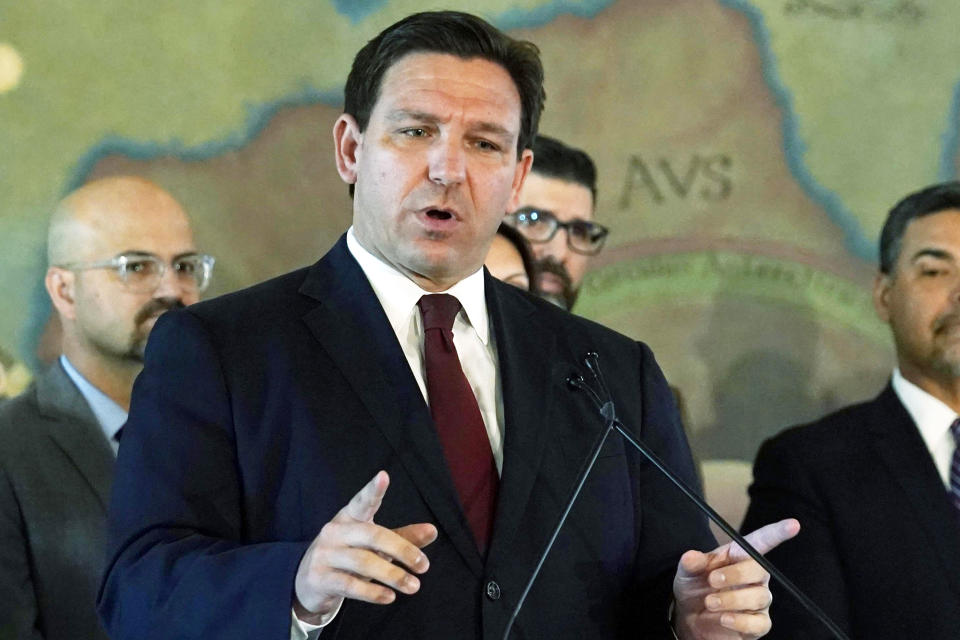 FILE - Florida Gov. Ron DeSantis speaks at Miami's Freedom Tower, May 9, 2022. Florida’s new 15-week abortion was blocked and then quickly reinstated after an appeal from the state attorney general in a lawsuit challenging the restriction. Judge John C. Cooper issued the order temporarily halting the law after reproductive health providers argued that the state constitution guarantees the right to the procedure. The state quickly appealed his order, automatically putting the law back into effect Tuesday, July 5, 2022. (AP Photo/Marta Lavandier, File)