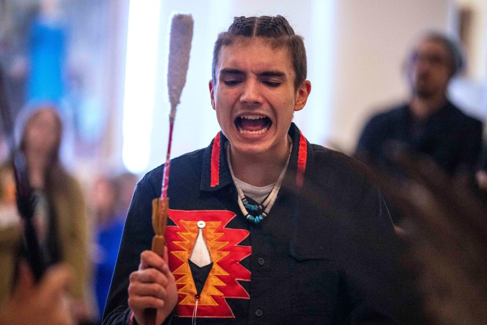 Amuwes Dana of the Passamaquoddy Tribe participates in a drum circle at the Hall of Flags in the State House, Wednesday, March 16, 2023, in Augusta, Maine. The ceremony proceeded Maine tribal leaders delivering the first State of the Tribes address in 20 years.