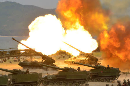 A military drill marking the 85th anniversary of the establishment of the Korean People's Army (KPA) is seen in this handout photo by North Korea's Korean Central News Agency. KCNA/Handout