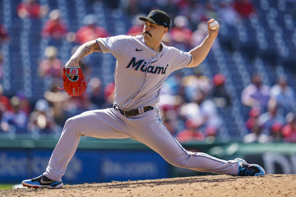 Miami Marlins relief pitcher Tanner Scott throws a pitch during the ninth inning of a baseball game against the Philadelphia Phillies, Wednesday, June 15, 2022, in Philadelphia. The Phillies won 3-1. (AP Photo/Chris Szagola)