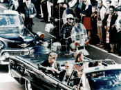 President John F Kennedy in the presidential limousine before his assassination. His wife Jacqueline is next to him and Texas Governor John Connally and his wife Nellie sit in front. (Photo: Universal History Archive/UIG via Getty Images)