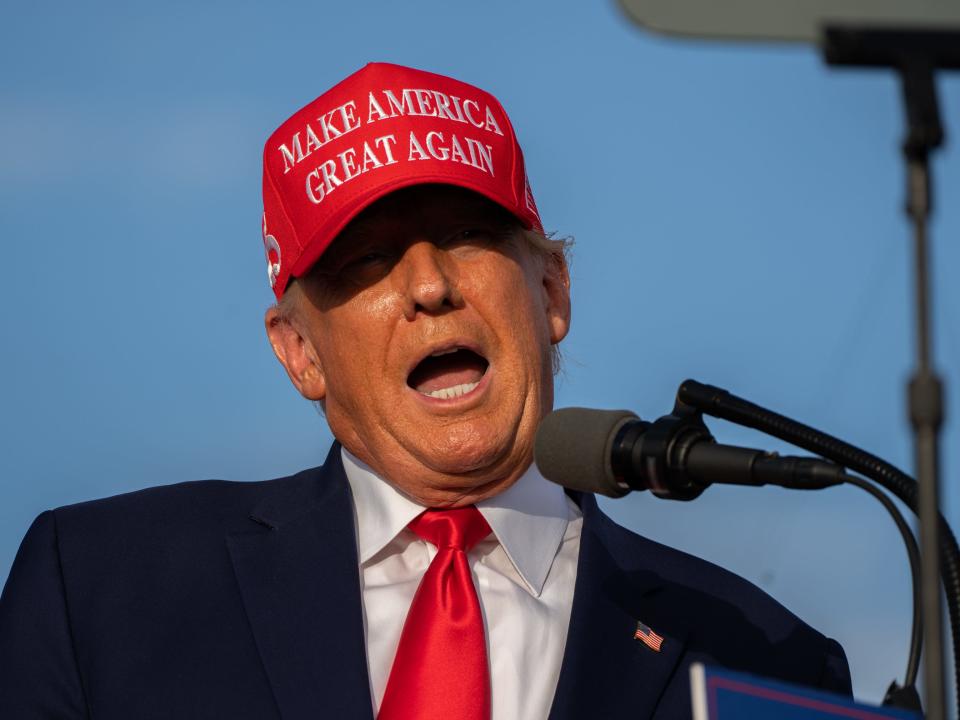 Rally goers, 45th President Donald Trump and Marco Rubio are seen at the Save America Rally at the Miami Dade County Fair and Expo in Miami on Sunday November 6, 2022.