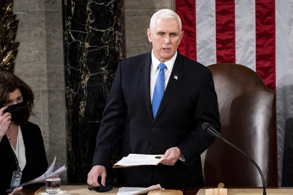 FILE - Vice President Mike Pence officiates as a joint session of the House and Senate convenes to confirm the Electoral College votes cast in November's election, at the Capitol in Washington, Wednesday, Jan. 6, 2021. Former Vice President Mike Pence has been subpoenaed by the special counsel overseeing investigations into efforts by former President Donald Trump and his allies to overturn the results of the 2020 election, Thursday, Feb. 9, 2023. (Erin Schaff/The New York Times via AP, Pool, File)