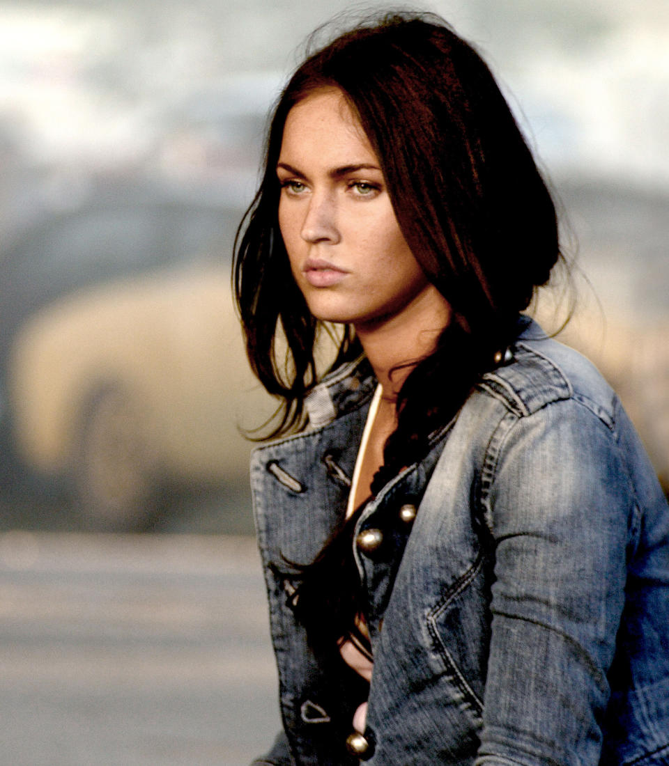 <p>Playing Mikaela Banes in the first two <em>Transformers</em> films may have made <a href="https://people.com/tag/megan-fox/" rel="nofollow noopener" target="_blank" data-ylk="slk:Fox;elm:context_link;itc:0;sec:content-canvas" class="link ">Fox</a> a star, but it's the fallout with director Michael Bay that led to the "absolutely low point" of her career. In 2009, the actress gave her most unfiltered take on working with Bay during an interview with <a href="https://www.wonderlandmagazine.com/2009/09/24/megan-fox-2/" rel="nofollow noopener" target="_blank" data-ylk="slk:Wonderland;elm:context_link;itc:0;sec:content-canvas" class="link "><em>Wonderland</em></a>.</p> <p>"He wants to be like Hitler on his sets, and he is," she told the outlet. "So he's a nightmare to work for but when you get him away from set, and he's not in director mode, I kind of really enjoy his personality because he's so awkward, so hopelessly awkward. He has no social skills at all. And it's endearing to watch him."</p> <p>Her "Hitler" comment got her fired from the franchise and replaced by Rosie Huntington-Whiteley. She reflected on the rocky time period in her cover story for <a href="https://www.cosmopolitan.com/uk/entertainment/a13096541/megan-fox-fired-transformers/" rel="nofollow noopener" target="_blank" data-ylk="slk:Cosmopolitan;elm:context_link;itc:0;sec:content-canvas" class="link "><em>Cosmopolitan</em></a> in 2017, saying that she learned from the experience.</p> <p>"That was absolutely the low point of my career," Fox said. "But without – 'that thing,' I wouldn't have learned as quickly as I did. All I had to do was apologise — and I refused. I was so self-righteous at 23, I couldn't see [that] it was for the greater good. I really thought I was Joan of Arc."</p>