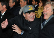 Diego Maradona, left, gestures as he stands next to Italian former soccer player Giancarlo Antognoni in Florence, Italy, on Jan. 17, 2017. Diego Maradona has died. The Argentine soccer great was among the best players ever and who led his country to the 1986 World Cup title before later struggling with cocaine use and obesity. He was 60. (Jennifer Lorenzini/LaPresse via AP)