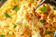 <p>It’s always a good time for mac ‘n cheese, but if you’re looking for a healthier, fall-friendly spin on the comfort food classic, <a href="https://www.chatelaine.com/recipe/world-cuisine-2/macaroni-and-cheese-with-roasted-butternut-squash/" rel="nofollow noopener" target="_blank" data-ylk="slk:this version with roasted butternut squash;elm:context_link;itc:0;sec:content-canvas" class="link ">this version with roasted butternut squash</a> is every bit as satisfyingly cheesy and indulgent while boasting a deep, nutty flavour profile that truly screams “autumn.”</p> <p>For any mac ‘n cheese recipe, you’ll need a great set of pots and pans. The <a href="https://www.canadiantire.ca/en/pdp/paderno-canadian-professional-clad-cookware-set-12-pc-1424519p.html?utm_source=vrz&utm_medium=display&utm_campaign=10009368_21_CTS_JNJ_FALL&utm_content=10009368_21_CTS_JNJ_FALL_EN_VRZ_CONS_TR_CAN_UTM_1x1_Kitchen%20Cookware" rel="nofollow noopener" target="_blank" data-ylk="slk:PADERNO Canadian Professional Clad Cookware Set, 12-pc;elm:context_link;itc:0;sec:content-canvas" class="link ">PADERNO Canadian Professional Clad Cookware Set, 12-pc</a> is a high-quality set that includes all the essentials and comes with Canadian Tire’s TESTED Badge, meaning it's been vetted for quality by real Canadians.</p> <p>Once you’ve assembled your ingredients, pour everything into a <a href="https://www.canadiantire.ca/en/pdp/paderno-pre-seasoned-smooth-release-cast-iron-skillet-1424895p.html?utm_source=vrz&utm_medium=display&utm_campaign=10009368_21_CTS_JNJ_FALL&utm_content=10009368_21_CTS_JNJ_FALL_EN_VRZ_CONS_TR_CAN_UTM_1x1_Kitchen%20Cookware" rel="nofollow noopener" target="_blank" data-ylk="slk:cast iron skillet;elm:context_link;itc:0;sec:content-canvas" class="link ">cast iron skillet</a>, top with breadcrumbs (try adding chopped sage for even more fall flavour!) and bake until the top is golden brown and bubbly.</p> 