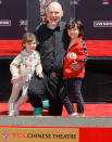 <p>Billy Corgan and his kids, Philomena and Augustus attend the Hand and Footprint Ceremony honoring the Smashing Pumpkins at TCL Chinese Theatre on May 11 in Hollywood. </p>