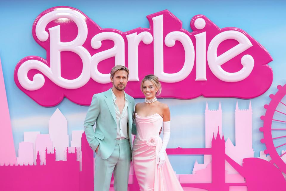 FILE - Ryan Gosling, left, and Margot Robbie pose for photographers upon arrival at the premiere of the film 'Barbie' on July 12, 2023, in London. “Barbie” is set to open across the Middle East on Thursday, Aug. 10, but moves by Kuwait and Lebanon to ban the film — apparently over it's alleged LGBTQ themes — has raised questions over how widely it will be released. (Scott Garfitt/Invision/AP, File)