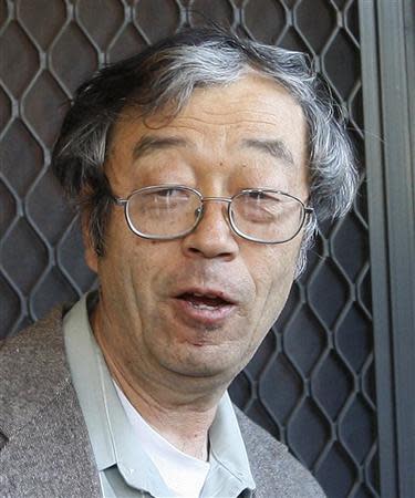 A man widely believed to be Bitcoin currency founder Satoshi Nakamoto is surrounded by reporters as he leaves his home in Temple City, California March 6, 2014. REUTERS/David McNew