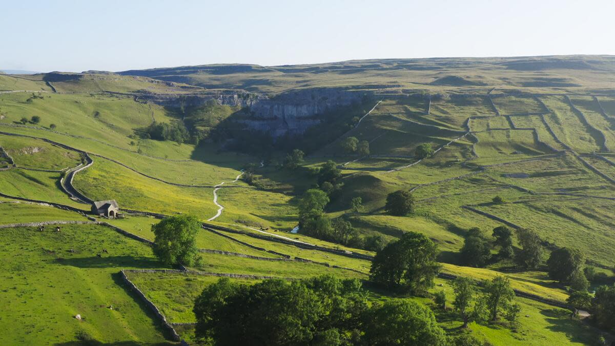 An aerial view of Malham Cove and the surrounding landscape (Ben Cherry/Silverback Films/PA)