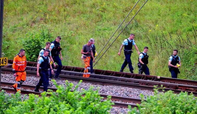 French police and national rail network staff survey high-speed rail lines in Croisilles, northern France, July 26, 2024, after acts of sabotage severely impacted the network on the day of the 2024 Paris Olympics opening ceremony.  / Credit: Reuters