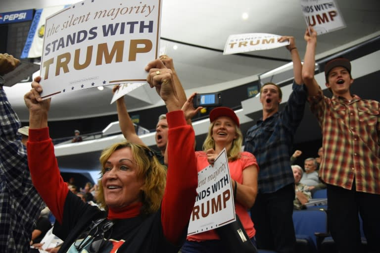 Supporters of Republican presidential candidate Donald Trump attend a campaign rally, May 25, 2016 in Anaheim, California