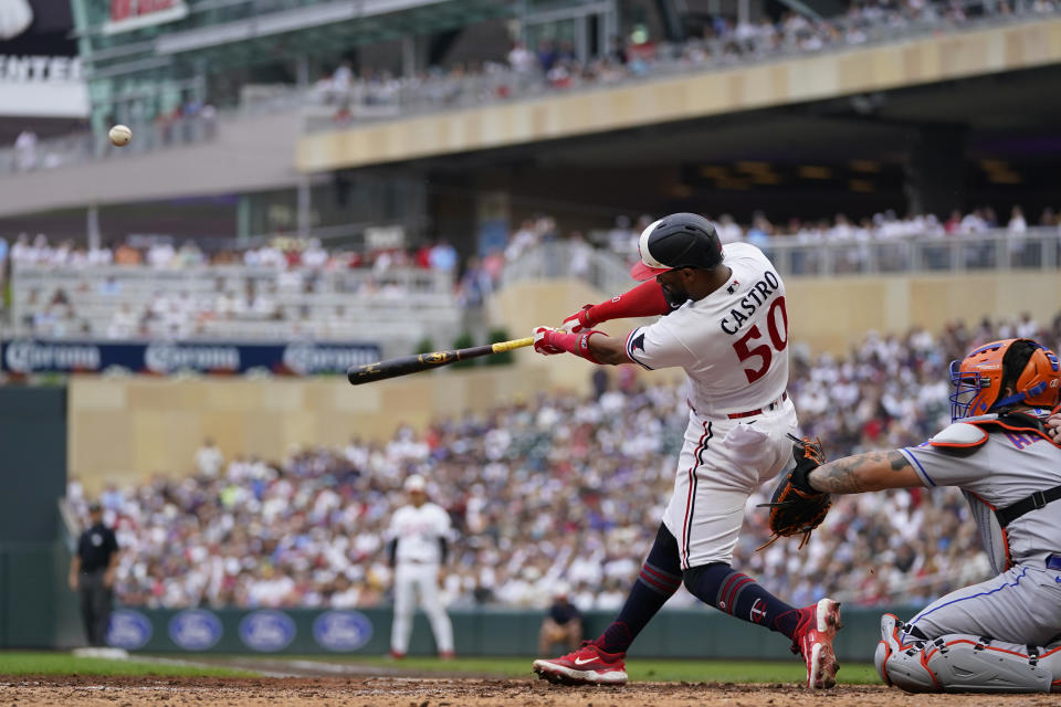 Minnesota Twins' Willi Castro (50) hits a solo home run during the eighth inning of a baseball game against the New York Mets, Saturday, Sept. 9, 2023, in Minneapolis. (AP Photo/Abbie Parr)