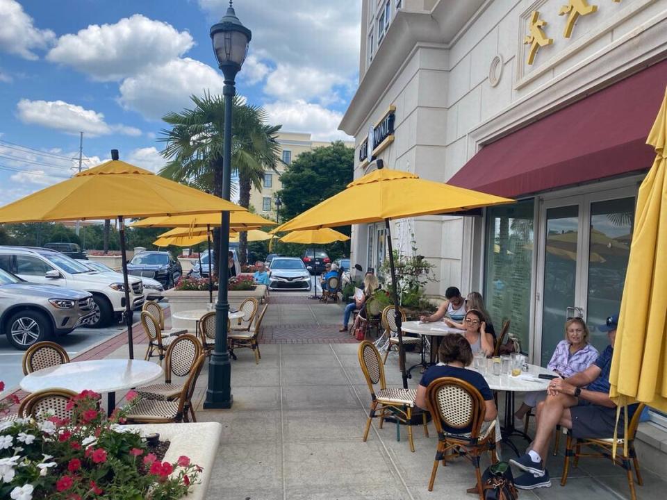 Café Monte’s patio sits right in front of the bakery, and you can’t miss its yellow umbrellas