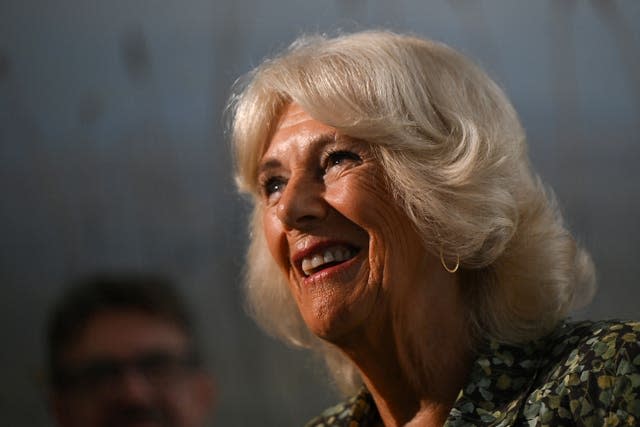 A close-up of Camilla smiling