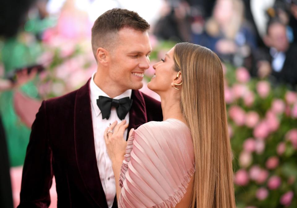 Free-agent quarterback Tom Brady and his wife Gisele Bundchen attend The Met Gala in May 2019.