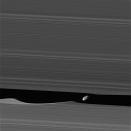 <p>The wavemaker moon, Daphnis, is featured in this view taken as NASA’s Cassini spacecraft made one of its ring-grazing passes over the outer edges of Saturn’s rings on Jan. 16, 2017. Daphnis (5 miles or 8 kilometers across) orbits within the 42-kilometer (26-mile) wide Keeler Gap. The little moon’s gravity raises waves in the edges of the gap in both the horizontal and vertical directions. (Photo: NASA/JPL-Caltech/Space Science Institute) </p>