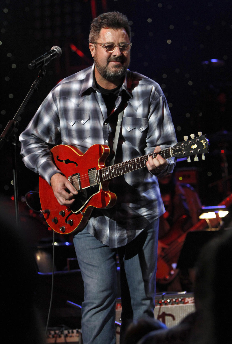 Vince Gill performed at All My Friends: Celebrating The Songs and Voice of Gregg Allman on Friday, Jan. 10, 2014 in Atlanta, Ga. (Photo by Dan Harr/Invision/AP)