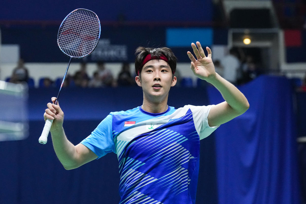 Singaporean shuttler Loh Kean Yew celebrates defeating Japan's Kanta Tsuneyama at the French Open. 