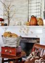 <p>A tree made of backyard sticks and raffia adds some height to this decidedly country mantel. Pumpkins, dried flowers, barnwood, and a letter display that spells "fall" round out the look.</p><p><strong>See more at <a href="http://www.thistlewoodfarms.com/a-fall-mantel/" rel="nofollow noopener" target="_blank" data-ylk="slk:Thistlewood Farms;elm:context_link;itc:0;sec:content-canvas" class="link ">Thistlewood Farms</a>.</strong> </p>