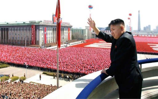 North Korean leader Kim Jong-Un waves to the crowd as he reviews a military parade in Pyongyang in April 2012. In a rare and remarkable interview posted on YouTube, the teenage grandson of late North Korean leader Kim Jong-Il has provided a glimpse into the secretive world of his country's ruling dynasty