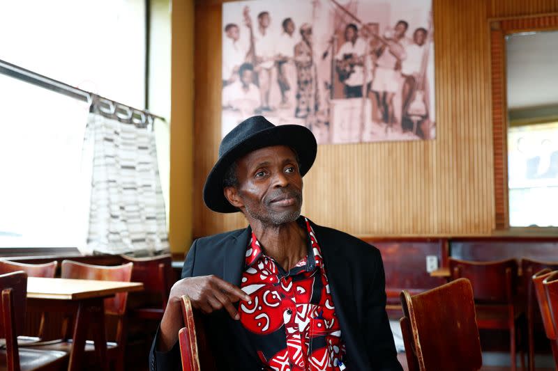 Belgian politician Ndiaye poses inside his African restaurant in Brussels