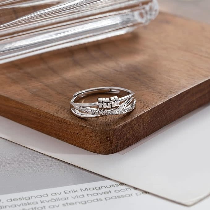 the fidget ring on a wooden surface