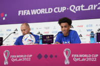 Head coach Gregg Berhalter, left, and Tyler Adams, both of the United States attend a press conference on the eve of the round of 16 World Cup soccer match between the Netherlands and the United States at Kalifa International Stadium, in Doha, Qatar, Friday, Dec. 2, 2022. (AP Photo/Ashley Landis)